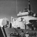 Ron Marlett talking with a friend in front of the USCGC Winnebago.