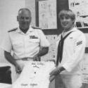 Admiral Prins and Ron Marlett celebrating Ron's artwork.