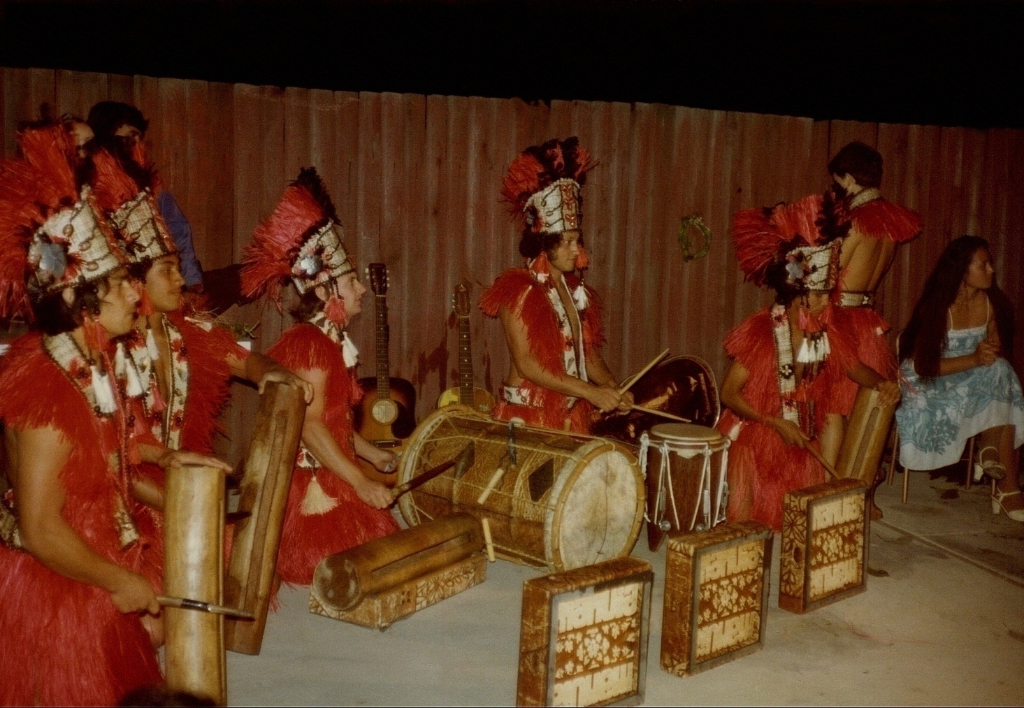 Ron Marlett playing drums at a luau.