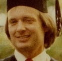 Ron Marlett with his brother and sister during graduation.