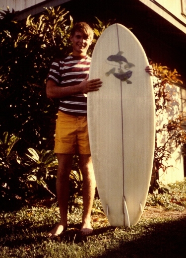 Ron Marlett with his surfboard in 1972.