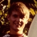 Ron Marlett with his surfboard in 1972.