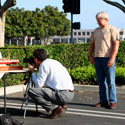 Ron Marlett's friend Anthony Mack taking a photograph of the USS Oregon.