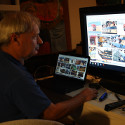 Ron Marlett studying images of the HMS Victory.