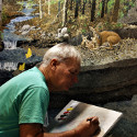 Ron Marlett working on his painting Ohio Spring.